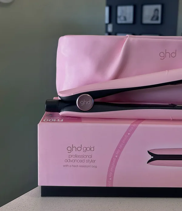 The ghd Pink edition styler in its pink box