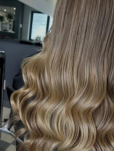 Close-up of glossy blonde waves